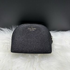 Kate Spade black glitter dome cosmetic pouch with gold logo